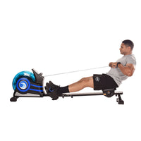 Man using a rowing machine on a white background