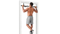 man using a door pull up bar equipment