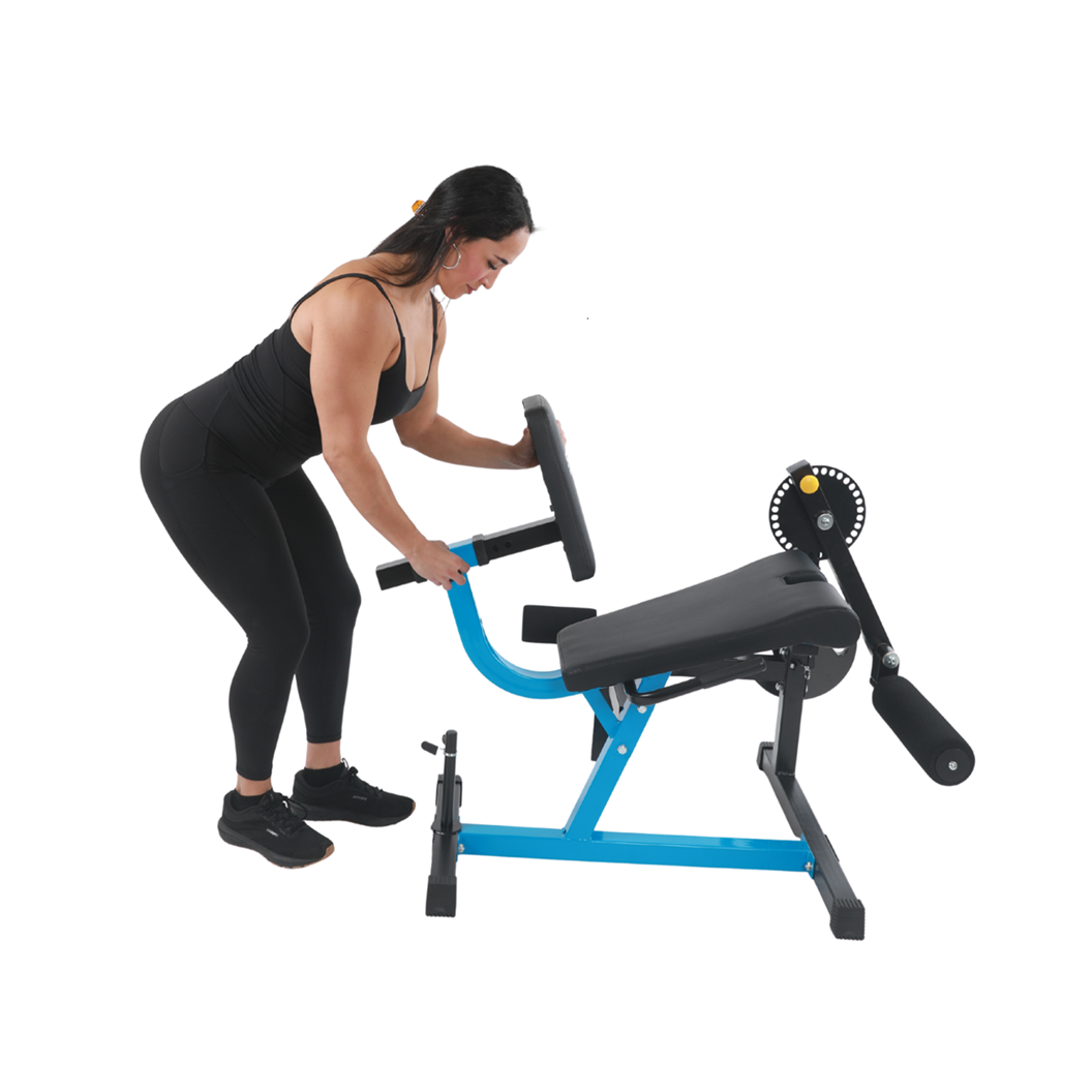 woman using Stamina Leg Extension & Curl Machine