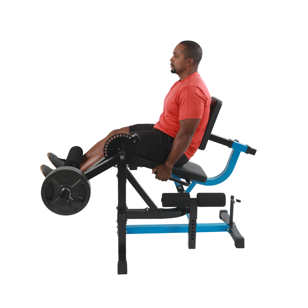 man using Stamina Leg Extension & Curl Machine