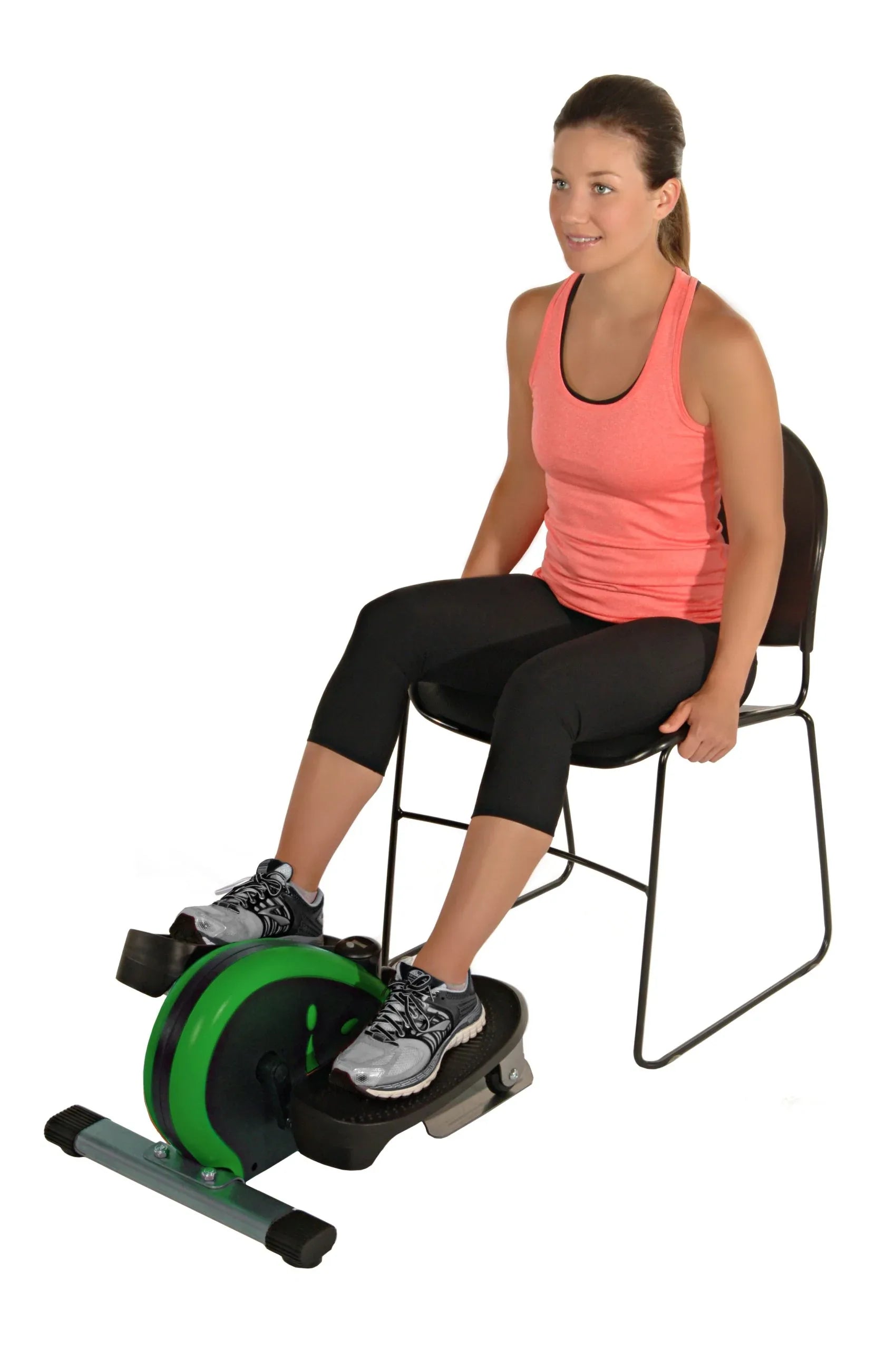 Woman using a step machine on a white background