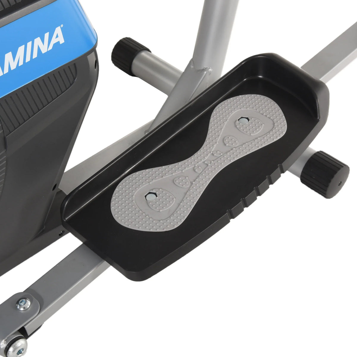 Close-up of a foot pad on an elliptical machine with 'stamina products' branding.