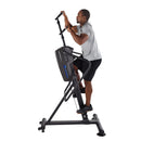 Man using a stair stepper machine for home on a white background