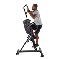 Man using a stair stepper machine for home on a white background
