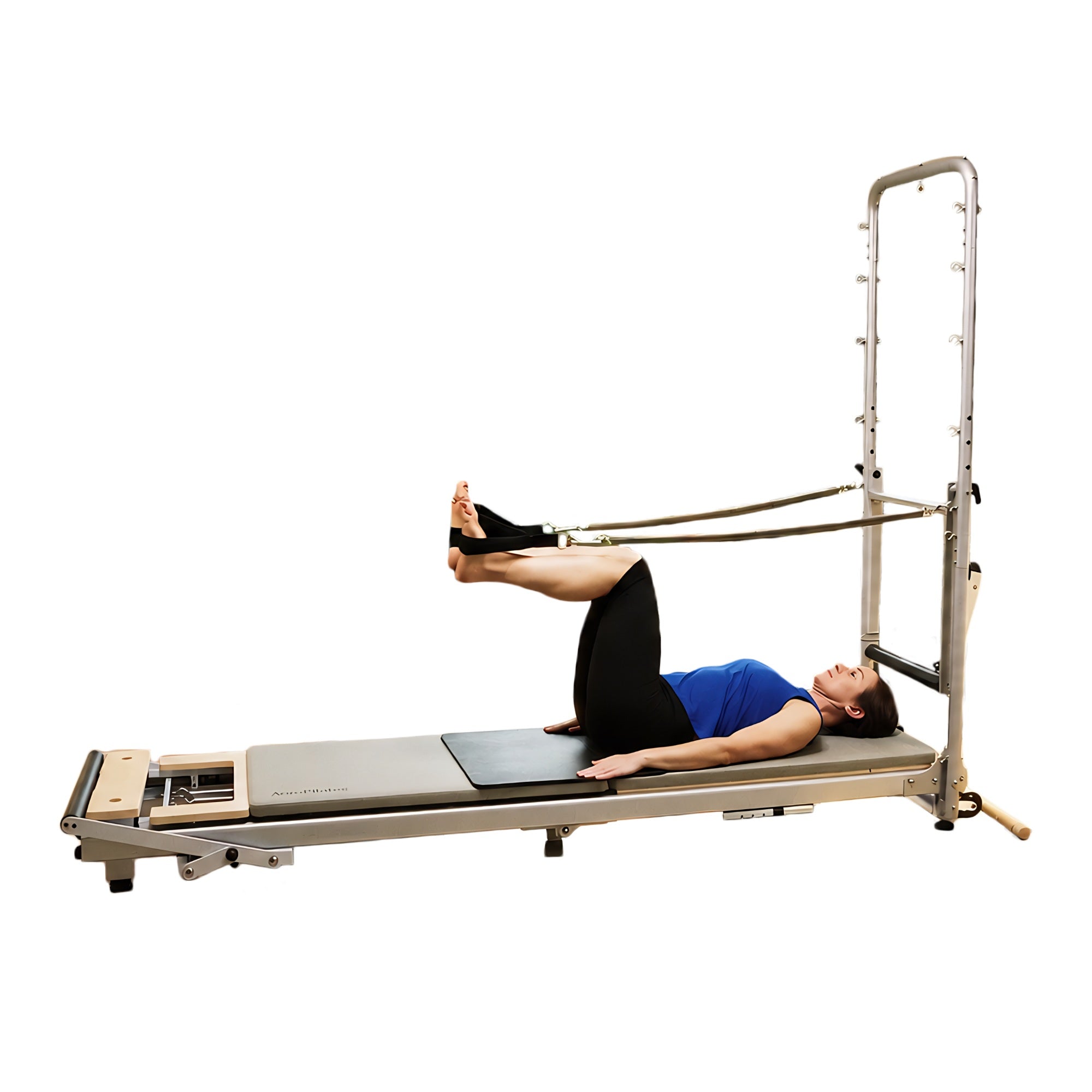 Person using a Pilates reformer machine on a white background