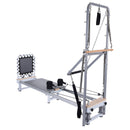 Pilates reformer machine on a white background