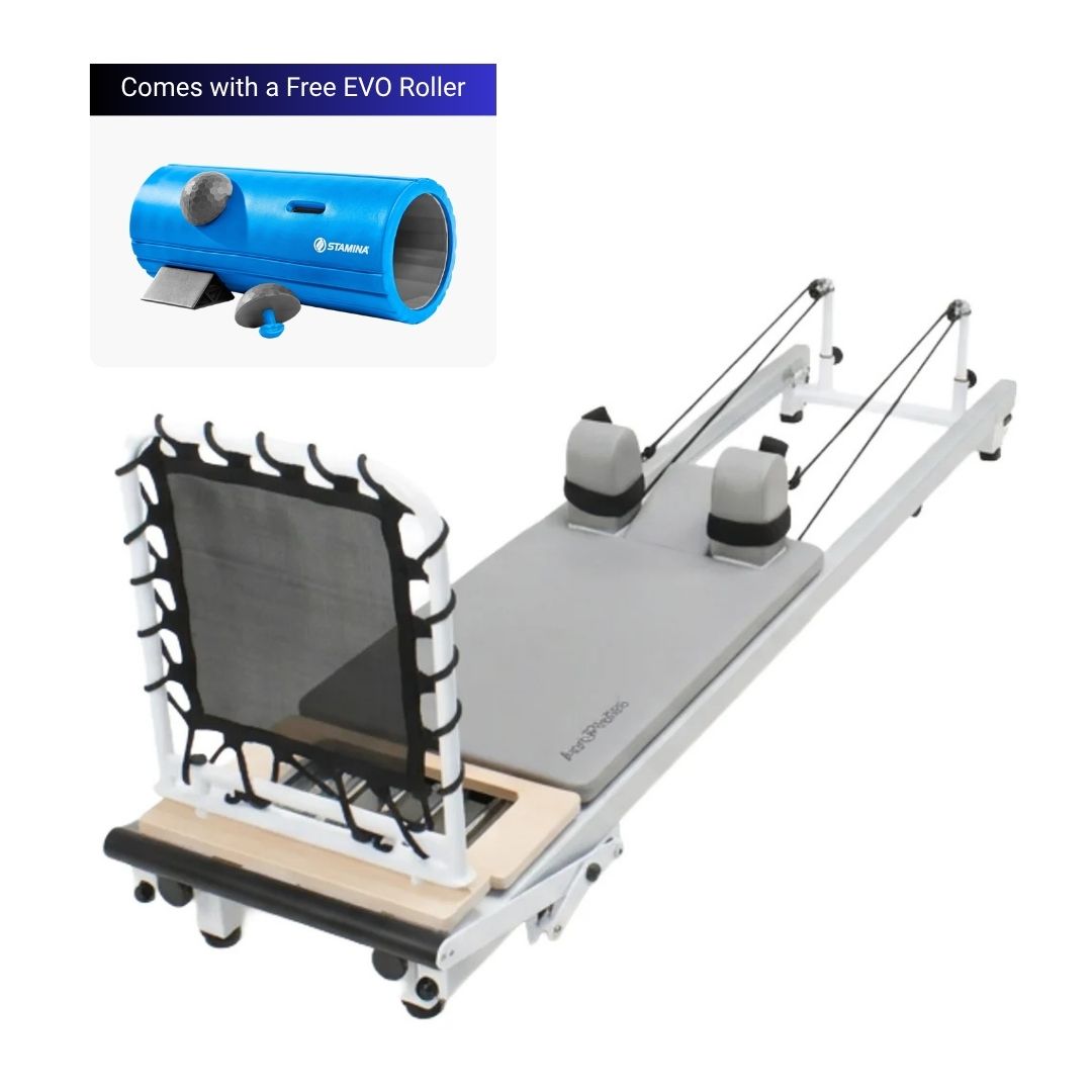 Pilates reformer machine on a white background for strength training, flexibility main image