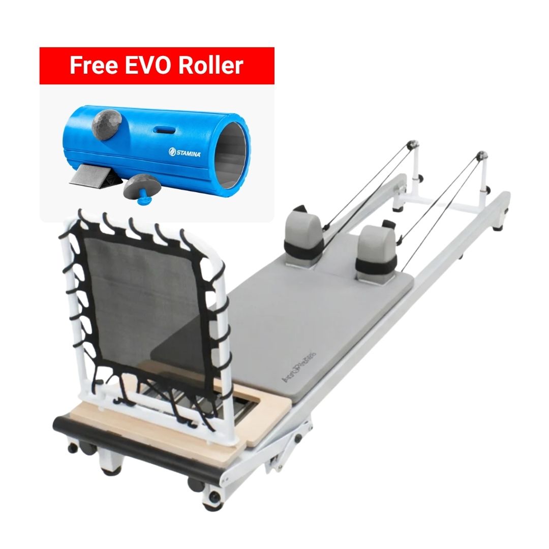 A Pilates reformer machine with an attached black spring trampoline, shown on a white background with a red promotional banner reading 'Free EVO Roller' and a blue EVO Roller accessory inset.