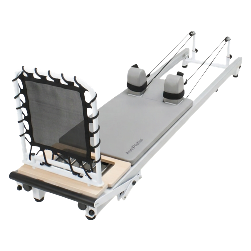 Pilates reformer machine on a white background for strength training, flexibility main image