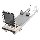 Pilates reformer machine on a white background for strength training, flexibility main image