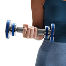 Person holding a blue and silver adjustable dumbbell against a white background