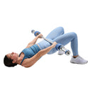 Person using a weight machine on a white background