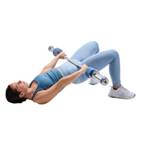 Person using a weight machine on a white background