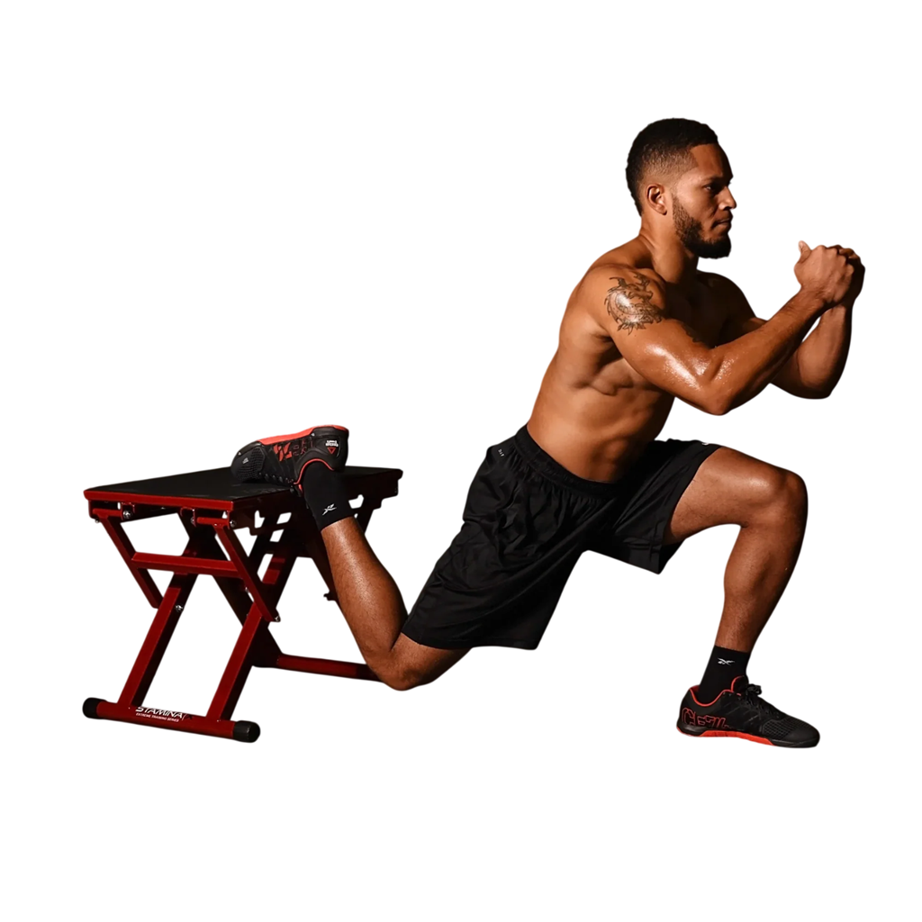 Man performing leg exercises on a red and black leg extension machine against a white background