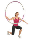 Woman holding a large hoop on a white background