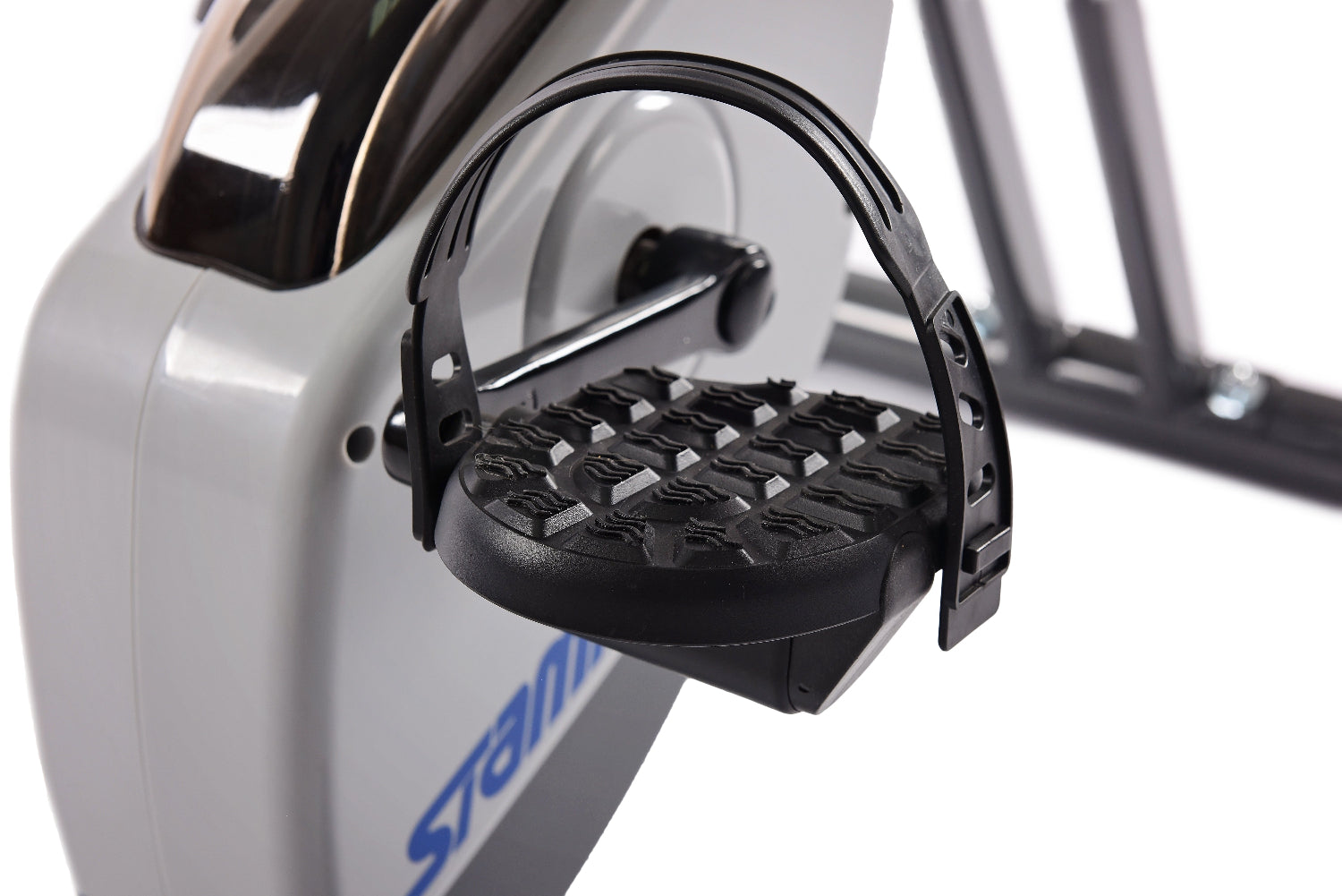 Close-up of a stationary bike pedal with 'Stamina' branding on a white background