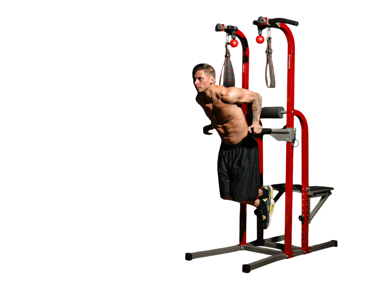 Man using a red pull-up bar and weight stand on a white background