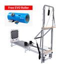 A Pilates reformer exercise machine with a spring-loaded carriage, wooden hand grips, and hanging weight straps, shown on a white background. A red banner at the top left reads 'Free EVO Roller' and an inset shows a blue EVO Roller tube accessory.
