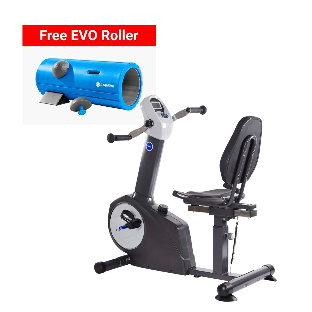 A black and gray recumbent exercise bike with a digital display and padded seat, shown on a white background. A red banner at the top reads 'Free EVO Roller,' and an inset shows a blue EVO roller tube accessory.