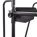 Close-up of a black Stamina Power Tower 1698 stand with a cylindrical component on a white background