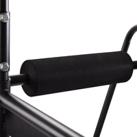 Black Stamina Power Tower 1698 with foam padding on a white background