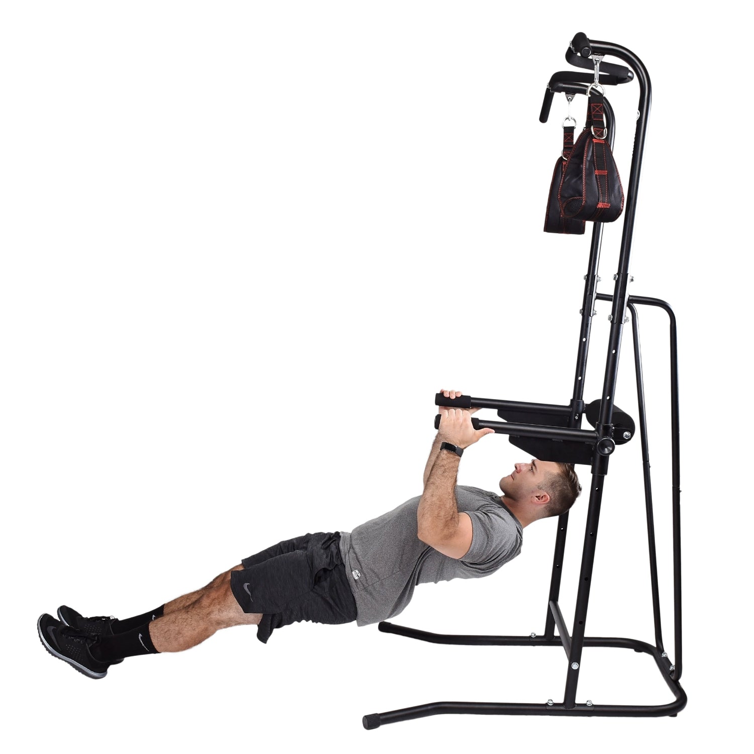 Person using a black Stamina Power Tower 1698 on a white background