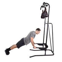 Person using a black Stamina Power Tower 1698 on a white background