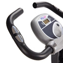 Close-up of a exercise bike handlebar with digital display on a white background
