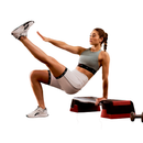 Woman exercising with a step platform on a white background