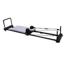 Pilates reformer on a white background