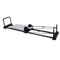 Pilates reformer on a white background
