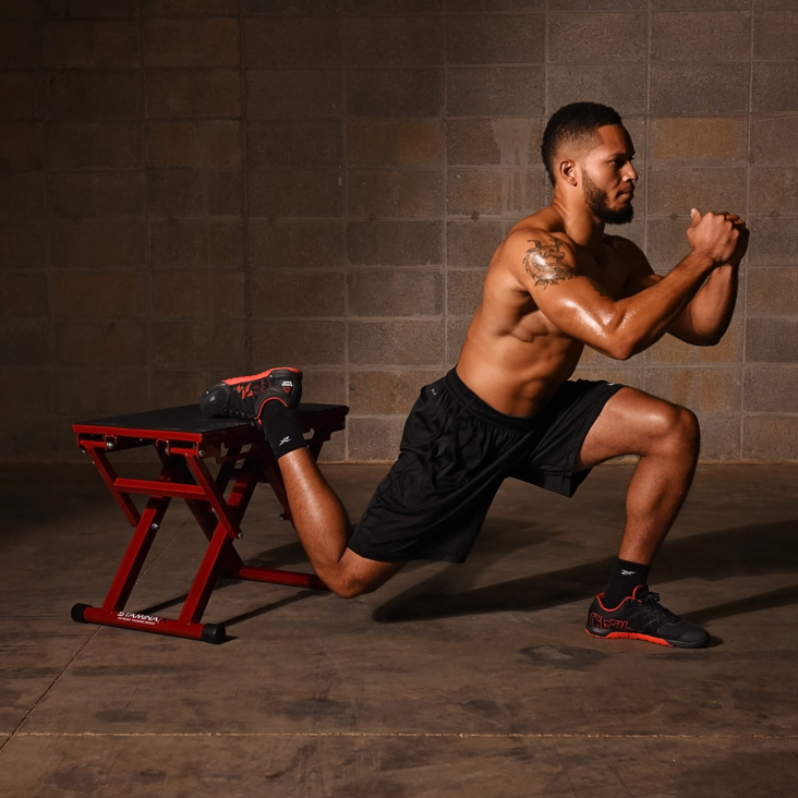 Man performing single legs squats on Stamina X Adjustable Plyo Box.