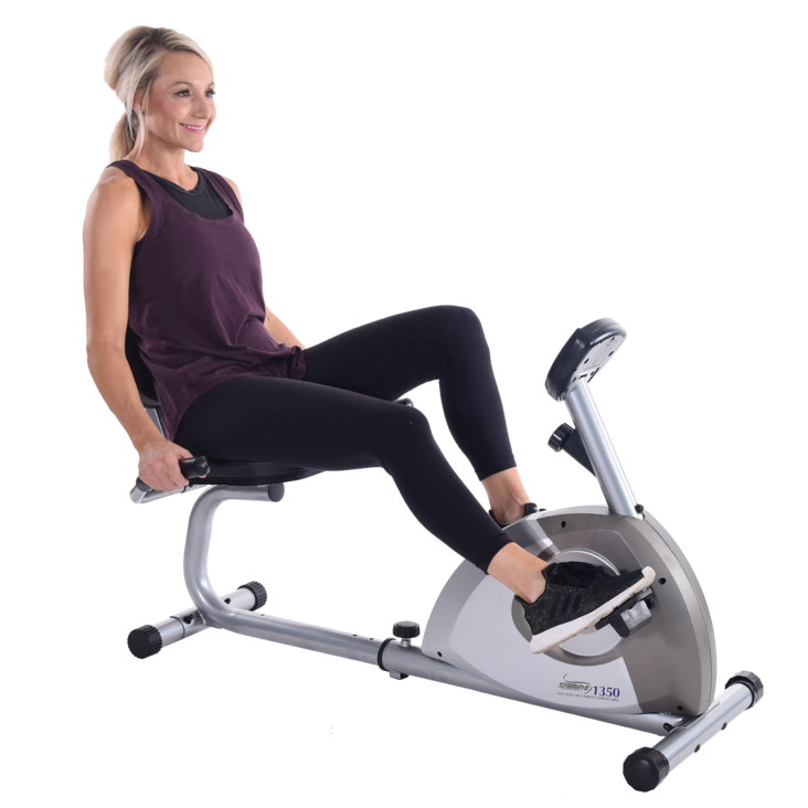 Woman cycling on Stamina Magnetic Recumbent 1350 Exercise Bike.