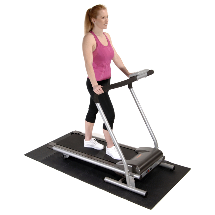 Woman workout on Stamina Fold-To-Fit Equipment Mat