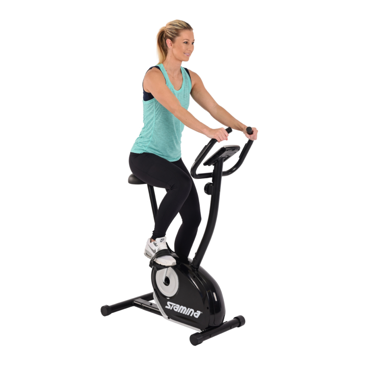Woman workout on Stamina Magnetic Upright Exercise Bike 1310