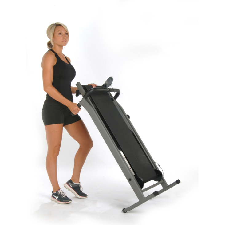 Woman on InMotion T900 Manual Treadmill