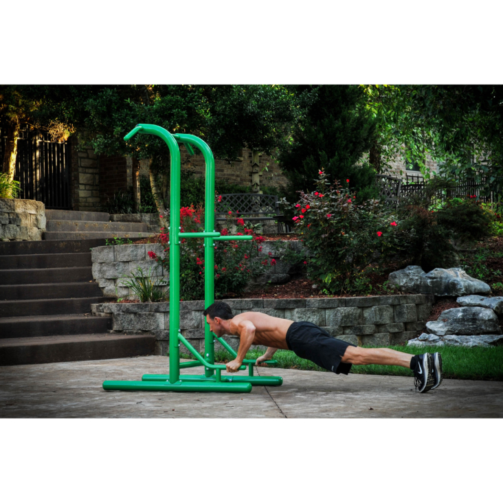 Man push up on Stamina Outdoor Fitness Power Tower