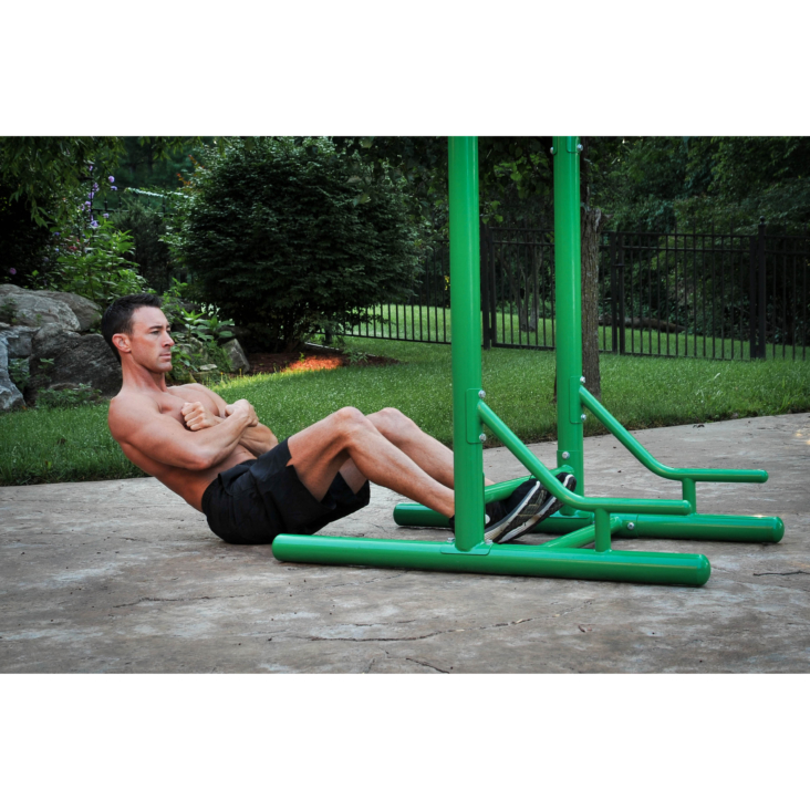 Man sit up on Stamina Outdoor Fitness Power Tower