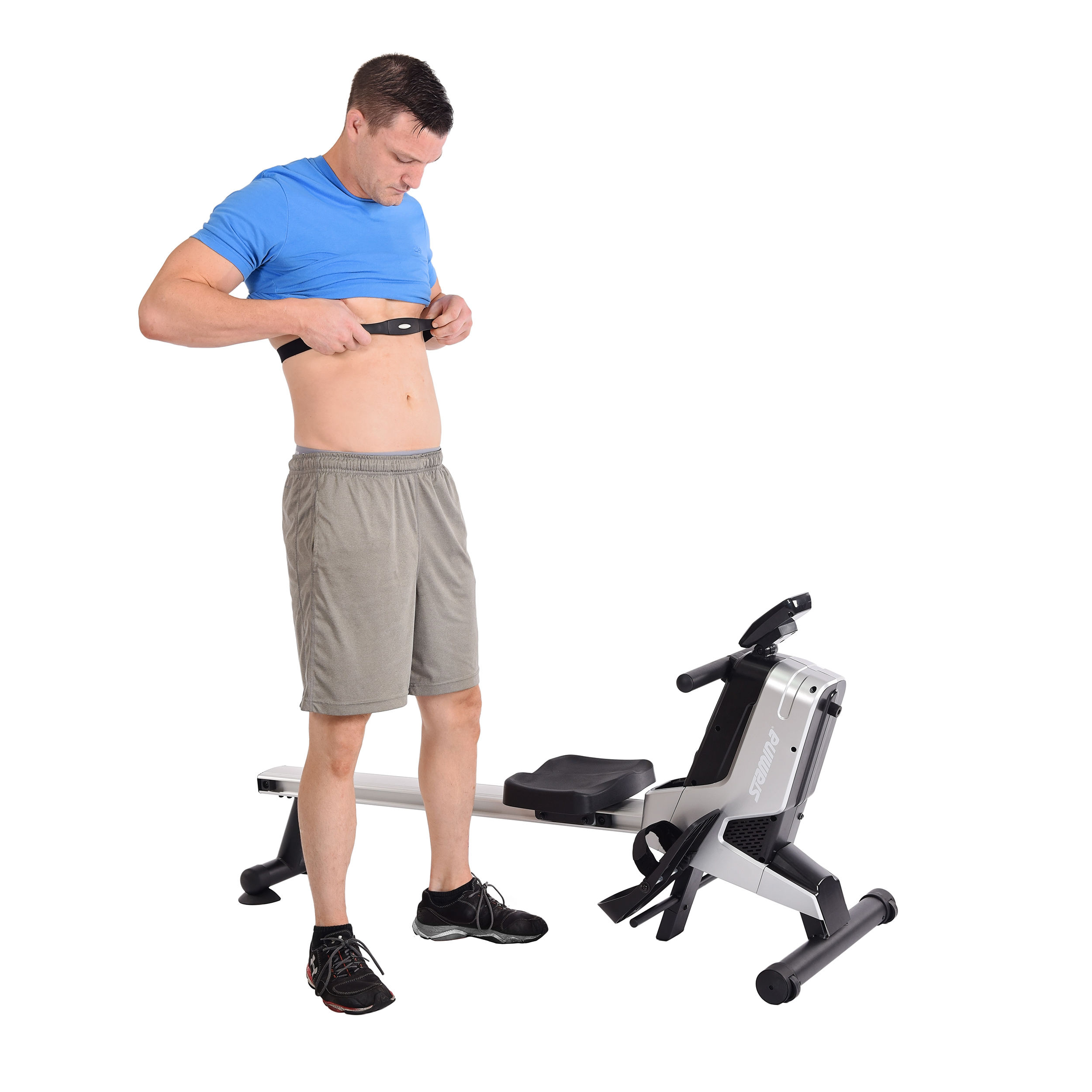 Man wearing heartrate on Stamina Products Rowing Machine 1130 exercise.