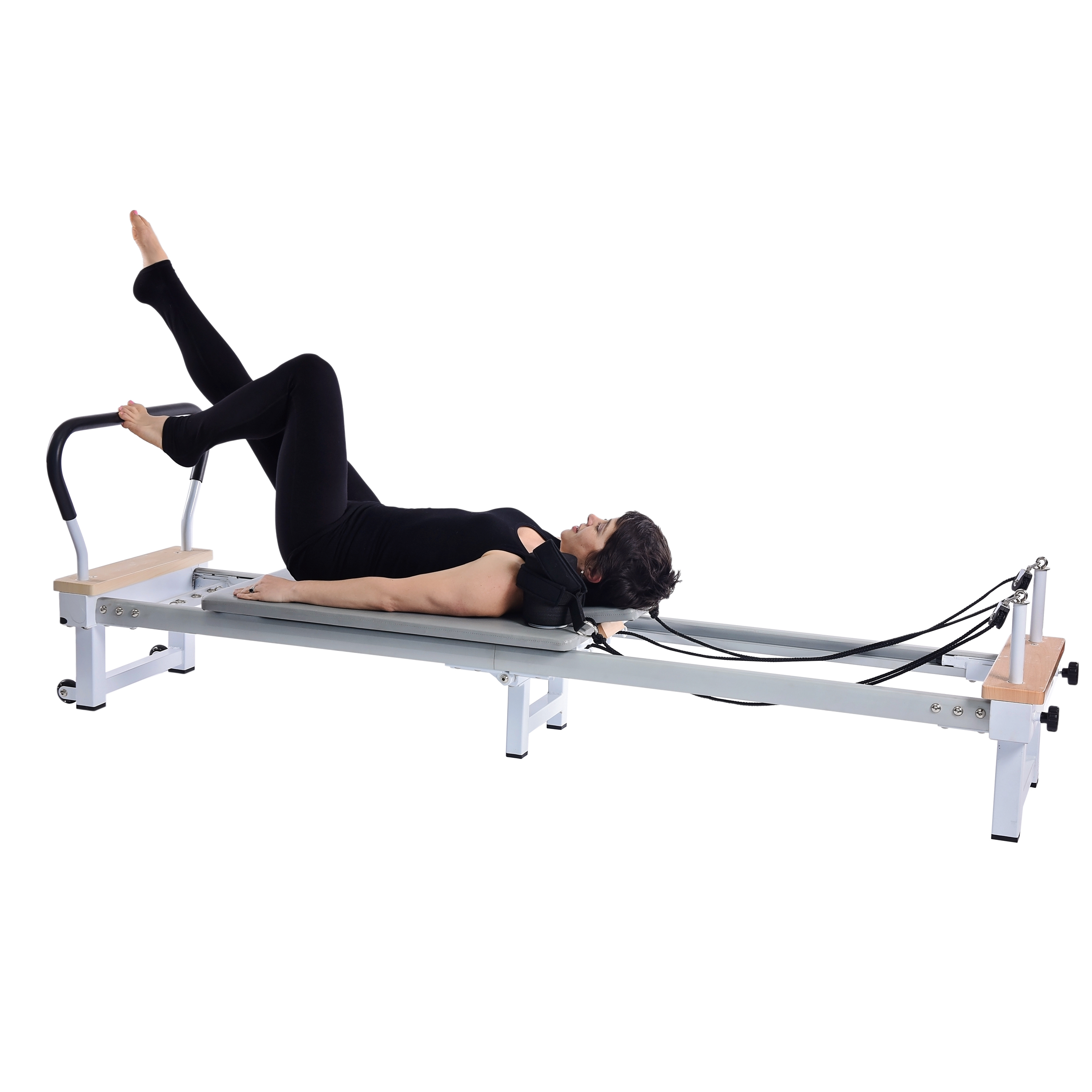 Premium Photo  Woman in workout clothes adjusting reformer pilates bed