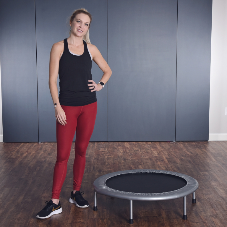 Woman standing at side on Fitness Trampoline.