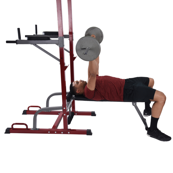 Man exercising with Barbell on Stamina Full Body Power Tower