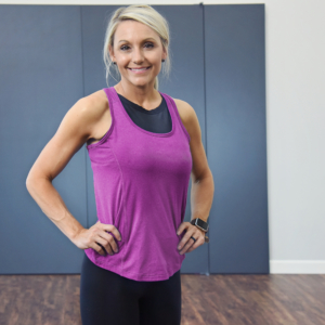Smiling woman with purple tank top