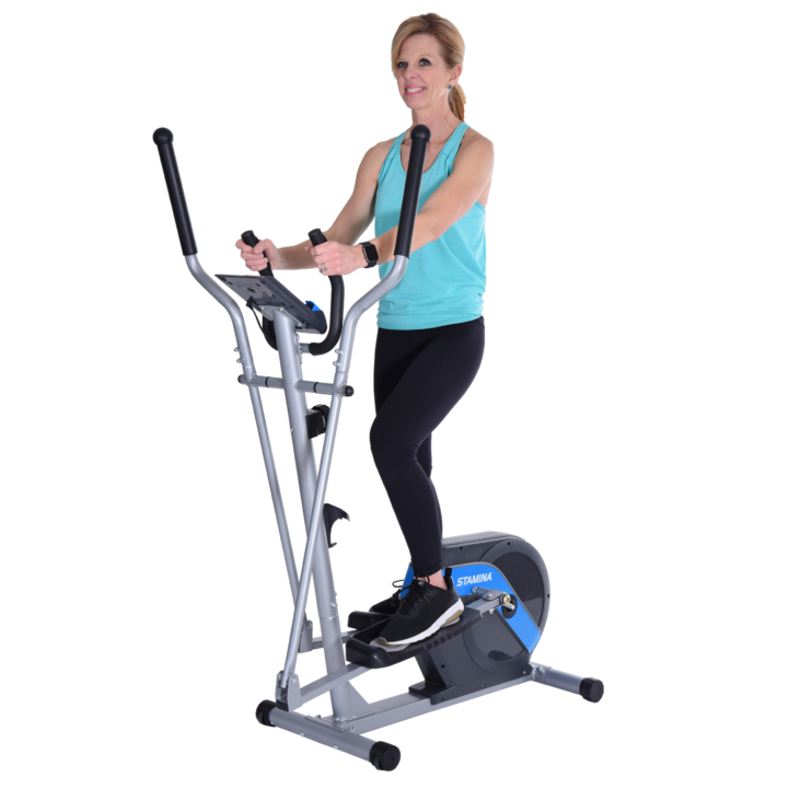 Smiling woman workout on Stamina Elliptical Trainer 703