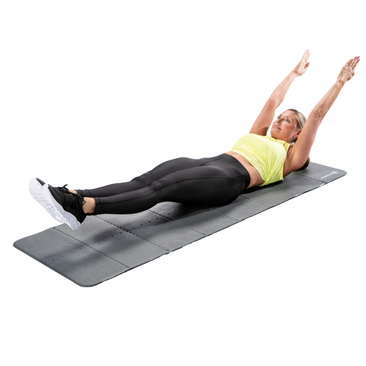 Lying woman lifting arms up and legs straight ahead