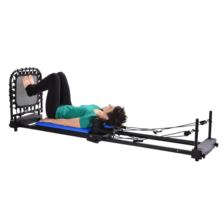 Woman using on AreoPilates Home Studio Reformer 387 Rebounder
