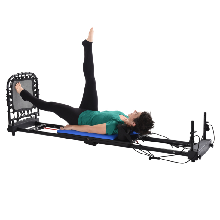 Woman exercising her legs on AreoPilates Home Studio Reformer 387