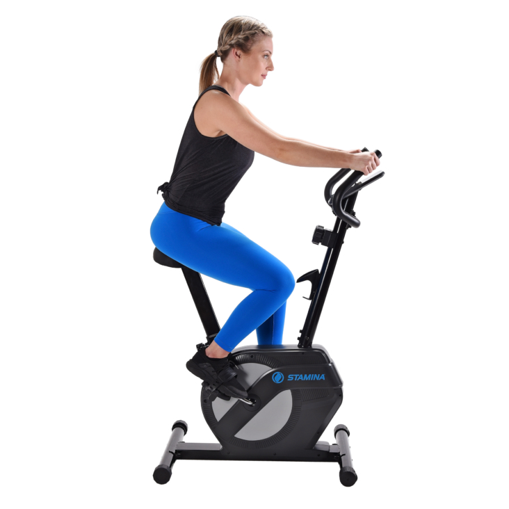 Woman cycling on Stamina Upright Exercise Bike 1308