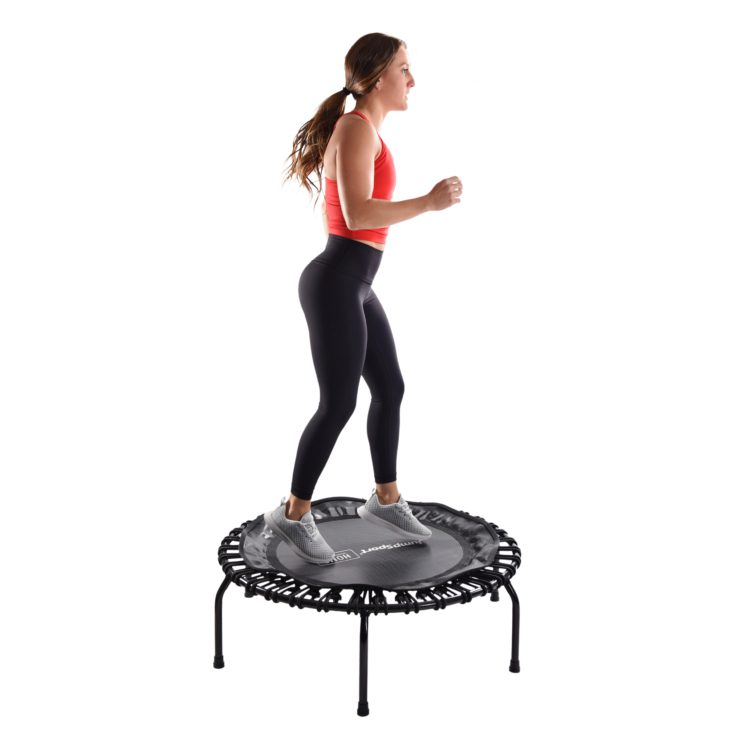 Woman performing jog bounce on Jumpsport Home Fitness Trampoline 105