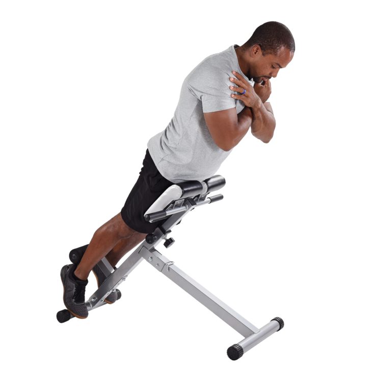 Man workout on Stamina Hyperextension Bench 2014